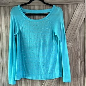 Scoop back Teal Jennifer Lopez sweater.  Love the back!